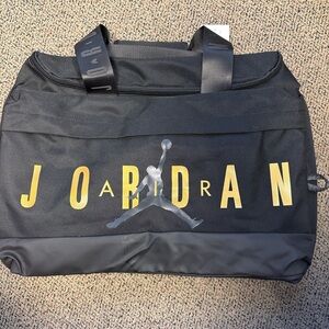 Jordan Shoe Garage Black Duffel Bag with Gold Logo